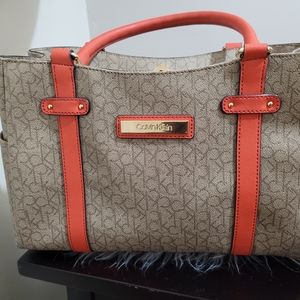 Calvin klein pattern and orange bag